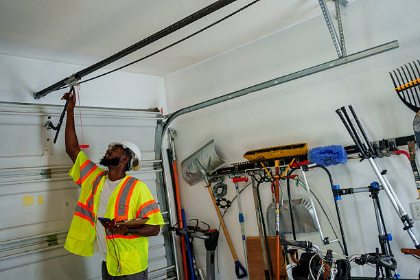 Professional Garage Door Roller Replacement technician working in Oconto, WI